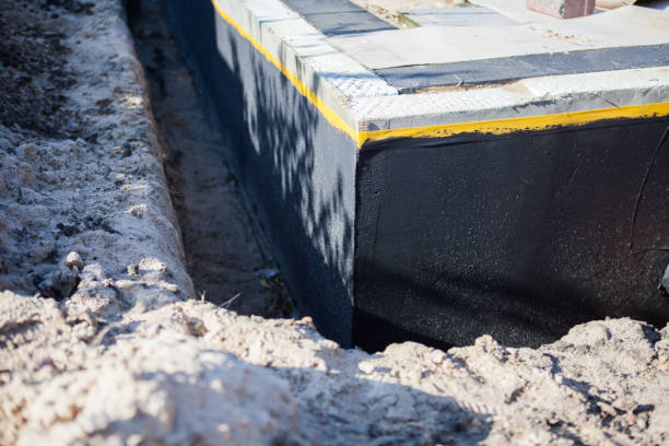 Professional Waterproofing technician working in Aurora, OH